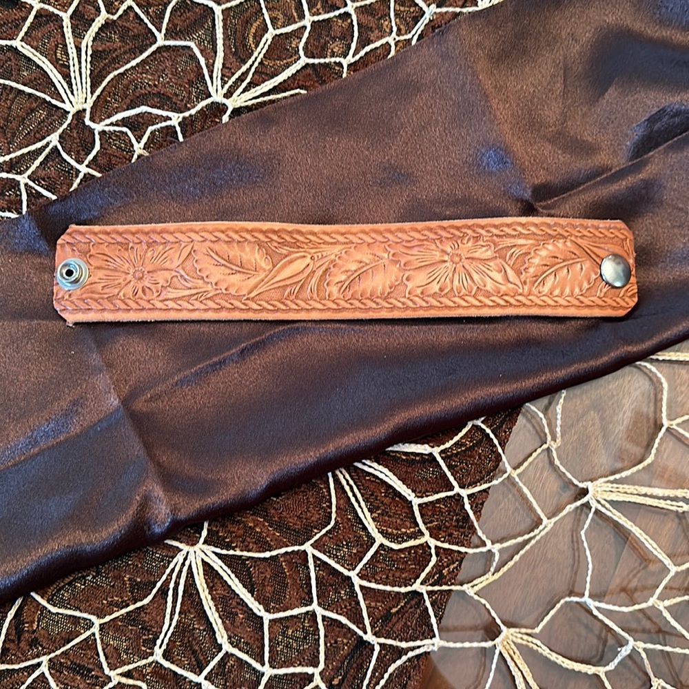 Stamped genuine leather cuff